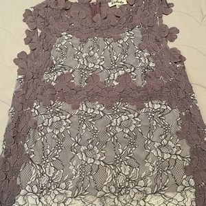 Soft violet blouse, with flower details